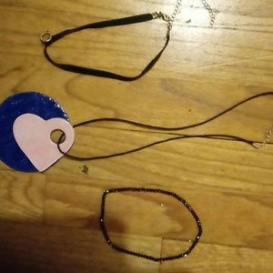 3 beautiful necklaces- two of which are chokers.